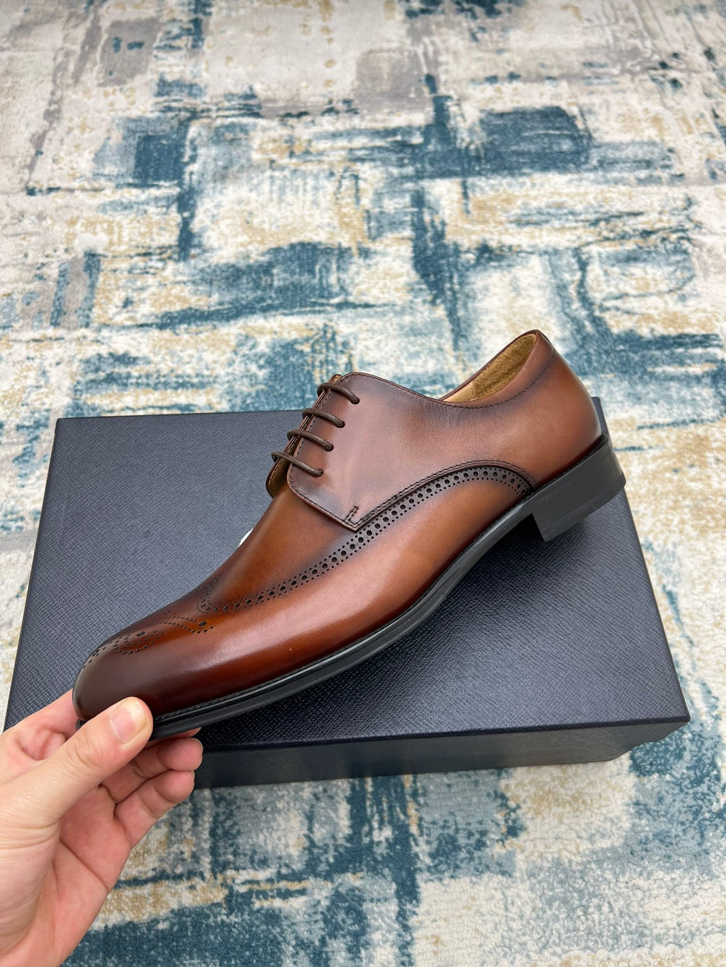 Prada unisex oxford shoe, brown leather lace-up with wingtip brogue detailing
