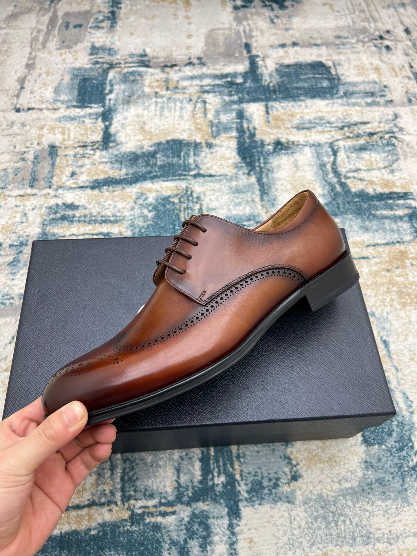 Prada unisex oxford shoe, brown leather lace-up with wingtip brogue detailing