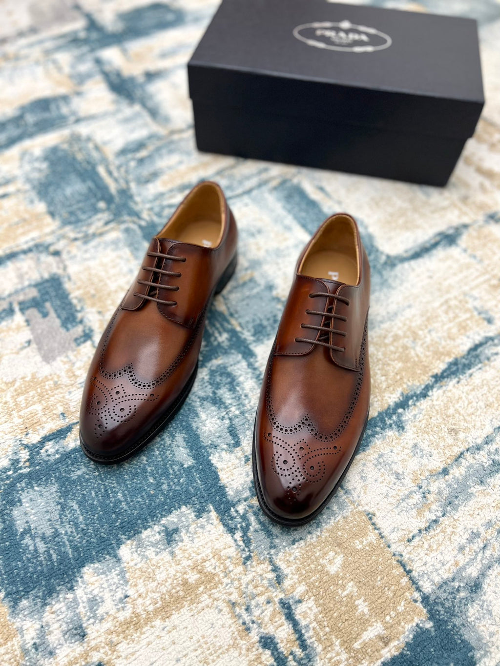 Prada unisex oxford shoes, brown leather lace-up with wingtip perforations