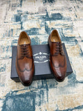 Prada unisex oxford shoes, brown leather lace-up with wingtip perforations