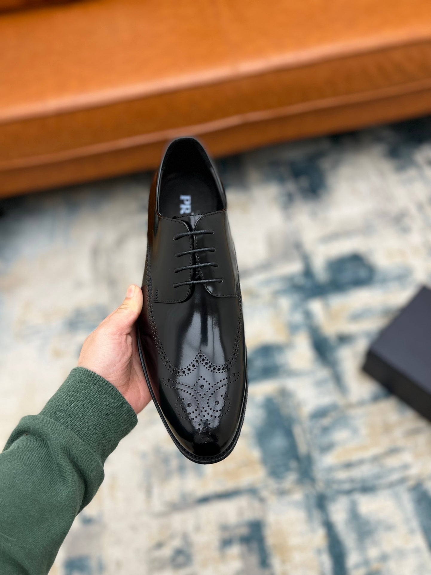 Black leather lace-up derby shoe with lace-up panel and Prada logo