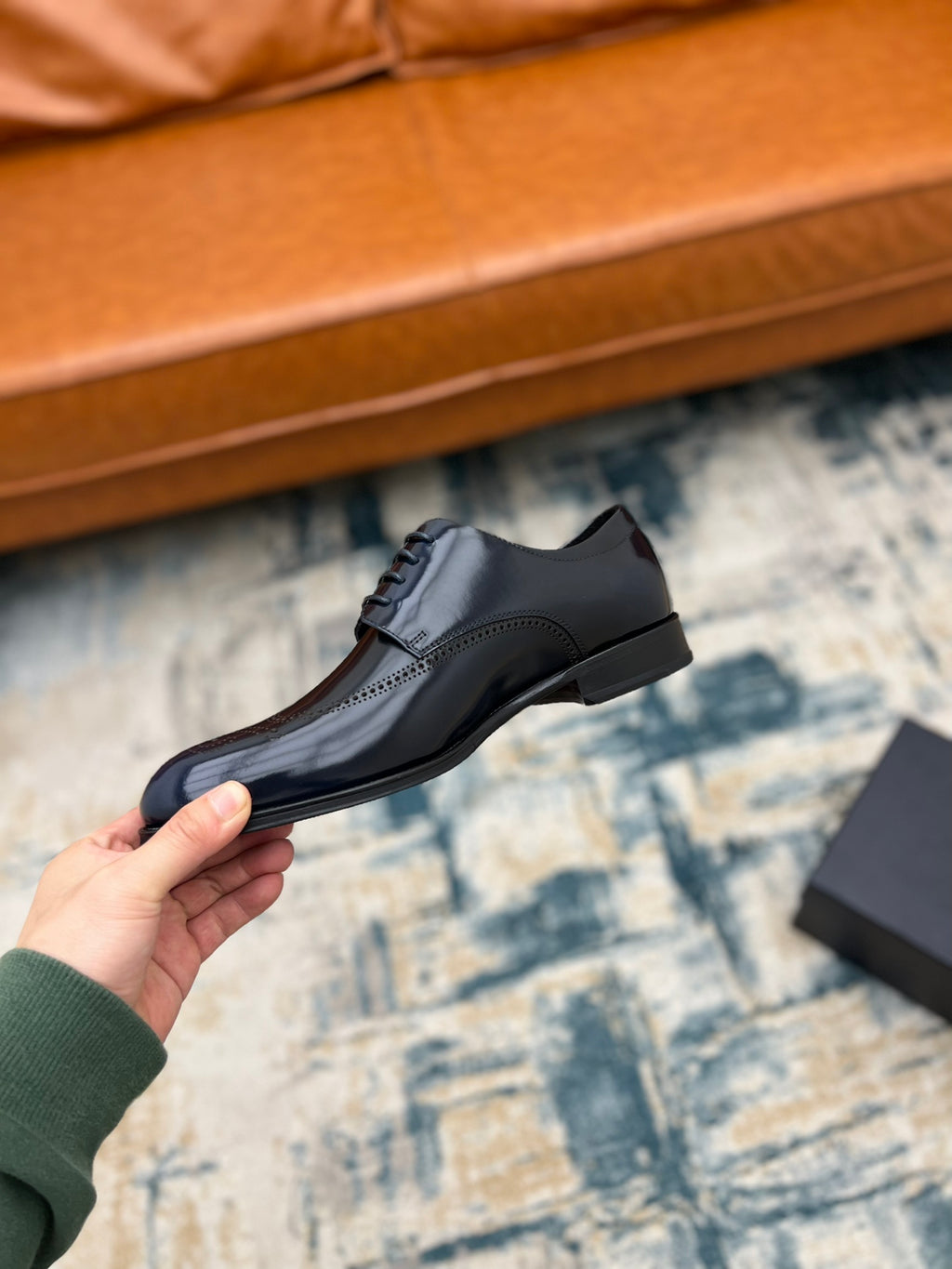 Prada lace-up leather derby shoe in dark leather with stitched panel seams