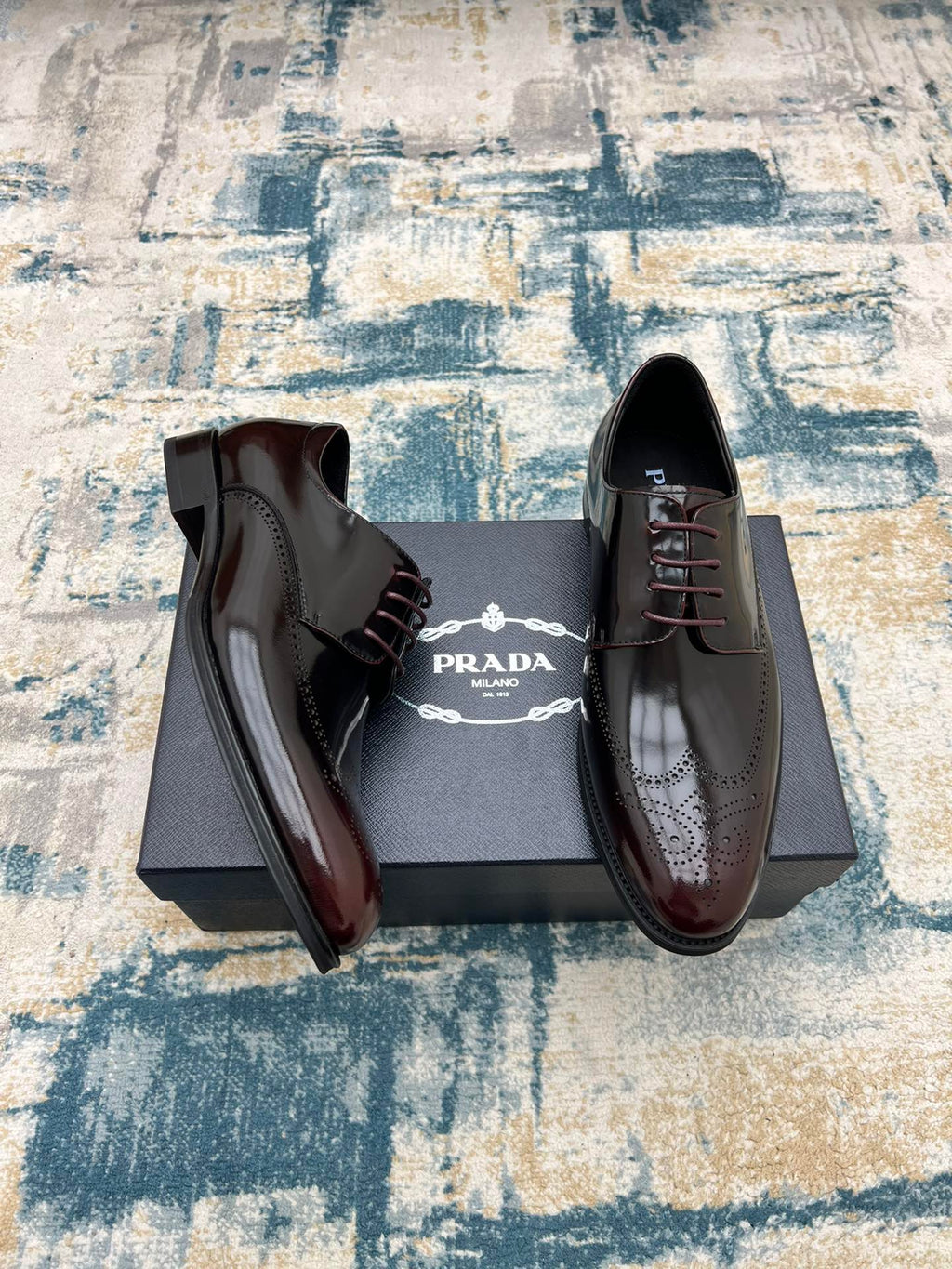 Prada unisex leather lace-up shoes, open top view, two-tone glossy design