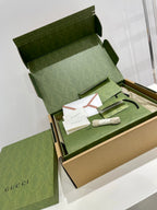 White Gucci unisex sneakers with blue-yellow star logos in gift set