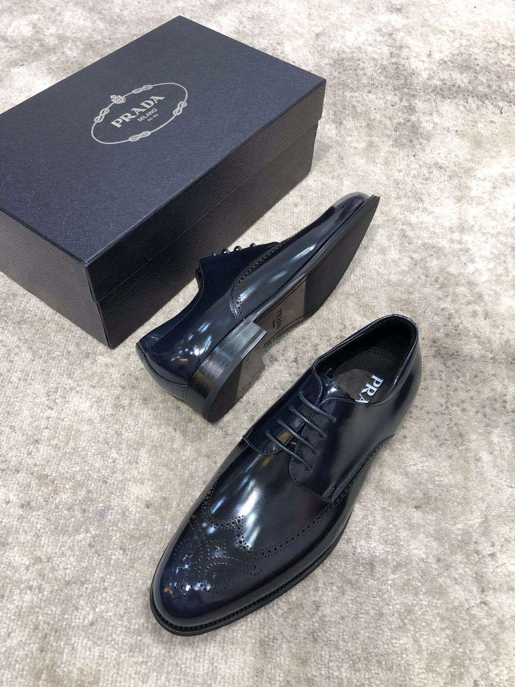 Prada unisex leather dress shoes, dark navy, front side view with lace-up