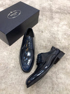 Prada unisex leather lace-up shoes, dark navy, side view with low heel