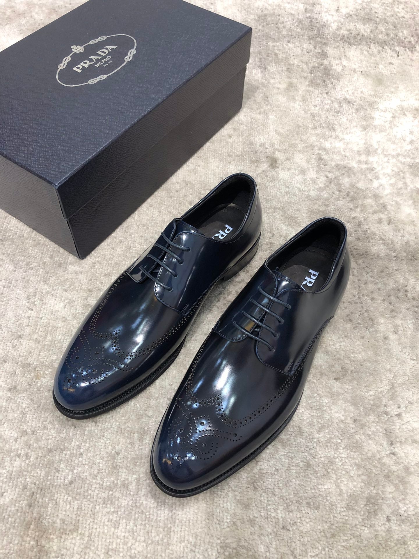 Prada unisex leather dress shoes, dark navy lace-up, rounded toe, wingtip brogue