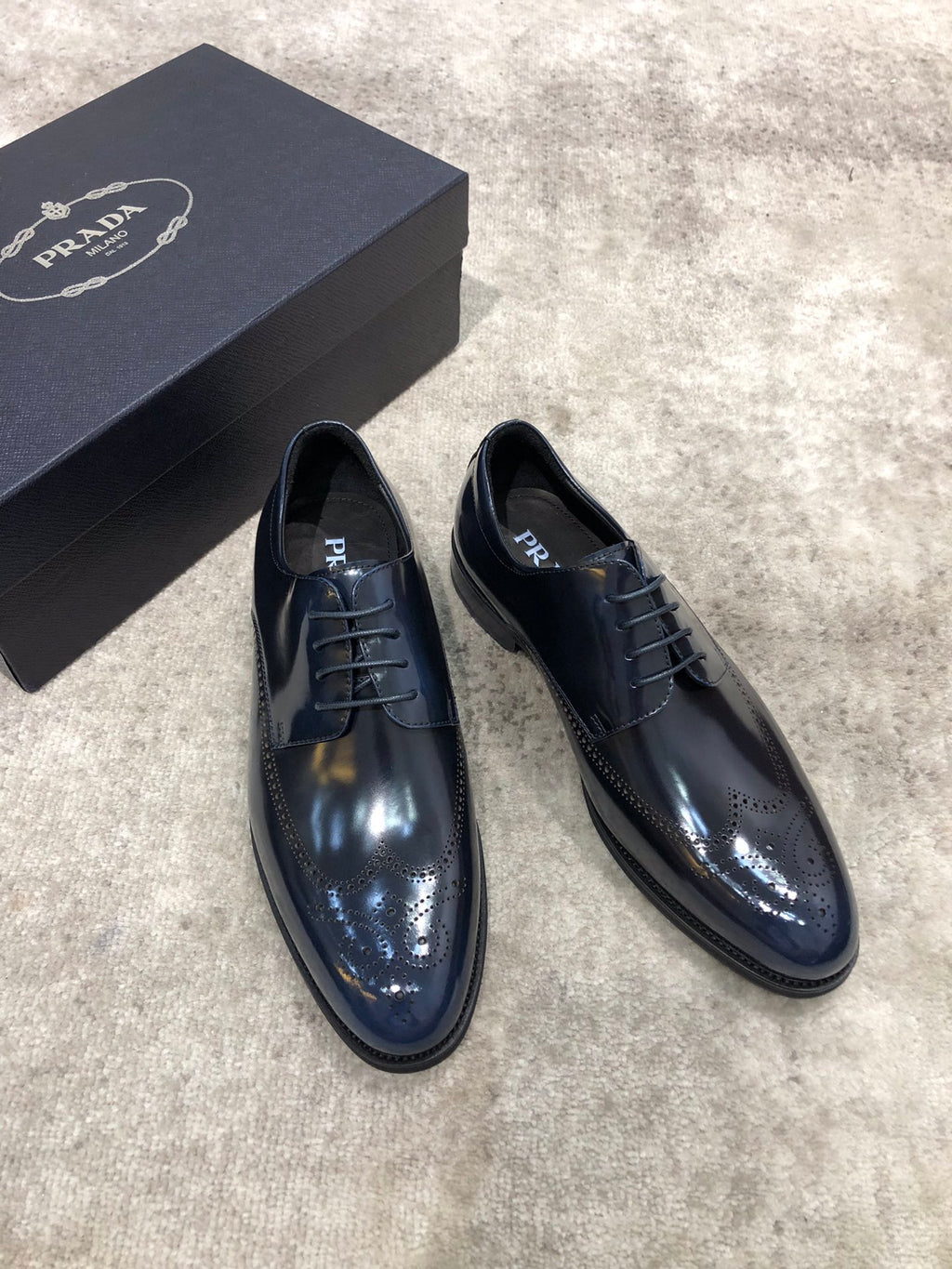 Prada unisex leather dress shoes, dark navy lace-up with polished brogue detailing