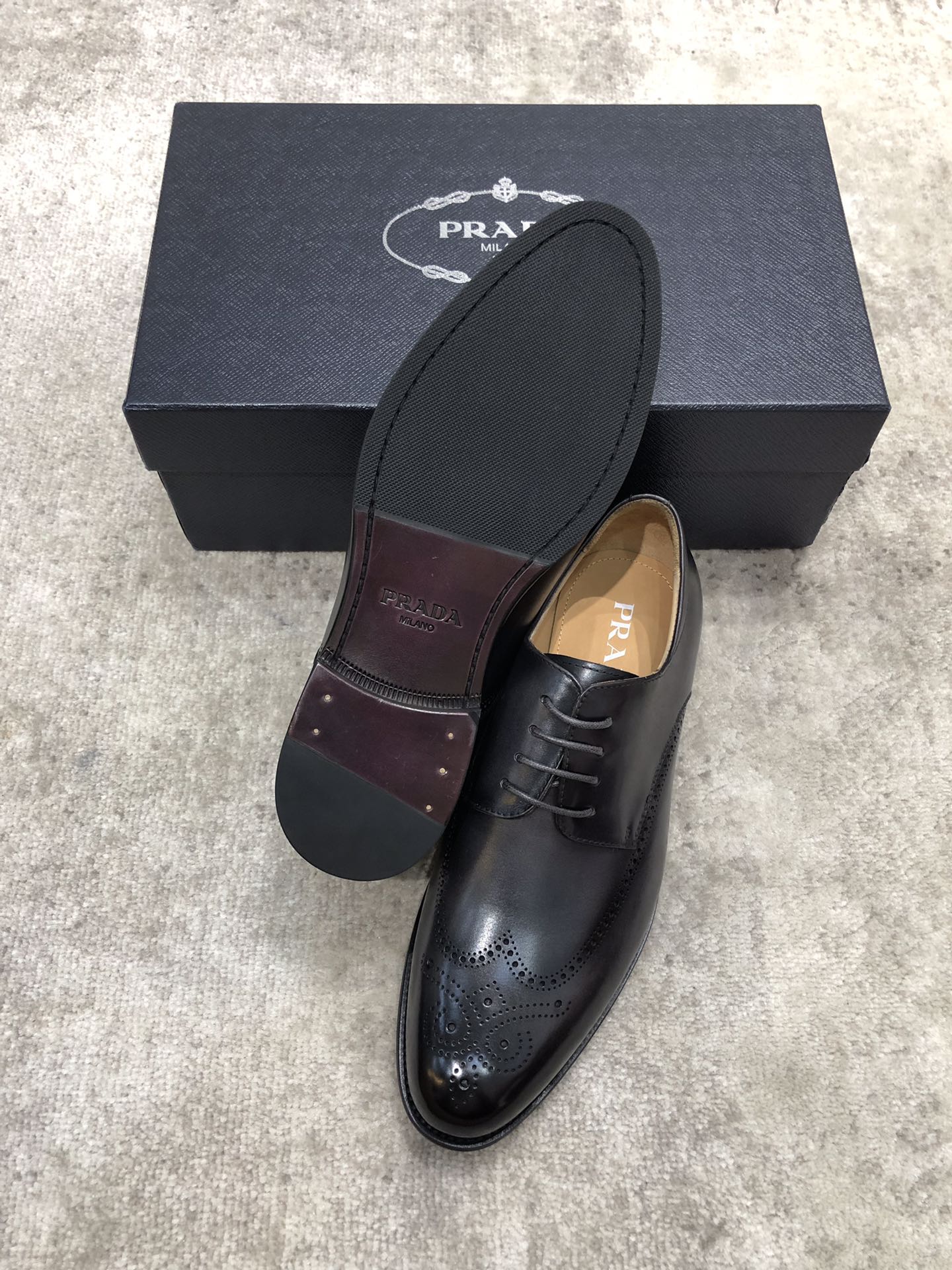 Prada unisex black leather lace-up oxford shoes with extra insole cover