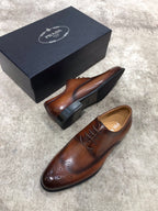 Prada brown leather lace-up brogue shoes with black sole underside