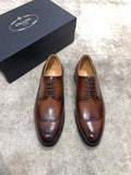 Prada unisex brown leather lace-up brogue shoes with perforated toe and black sole
