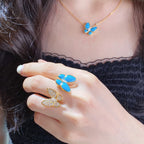 Blue-enamel butterfly necklace and matching ring with gold-tone crystal details