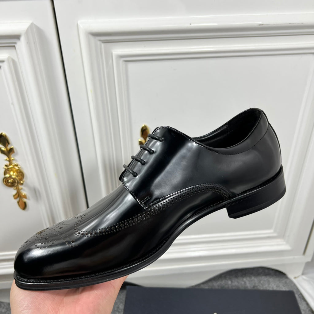 Prada unisex lace-up dress shoes, black leather with smooth side panel and low sole.