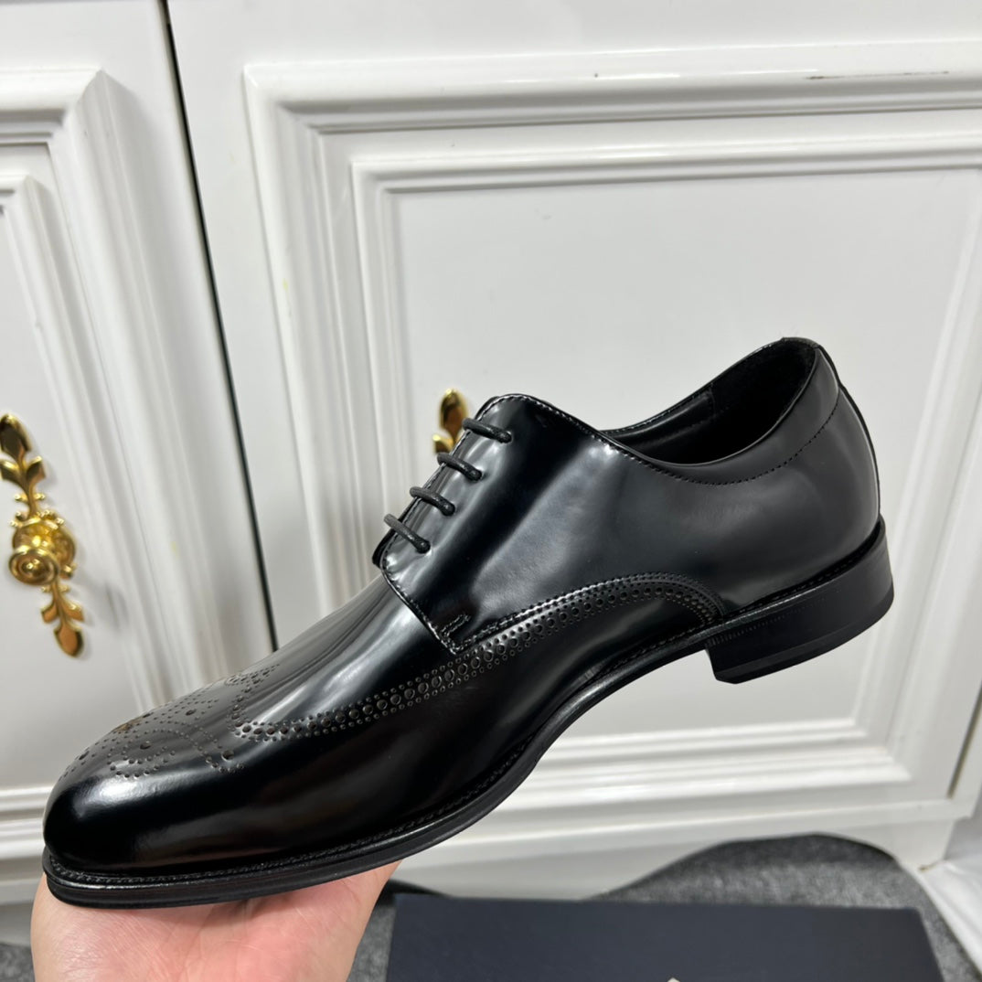 Prada unisex lace-up dress shoes, black leather with smooth side panel and low sole.
