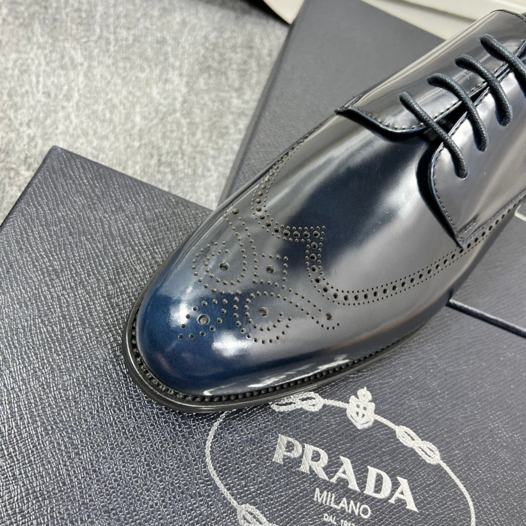 Prada unisex leather oxford shoe toe, dark blue with brogue perforation and laces