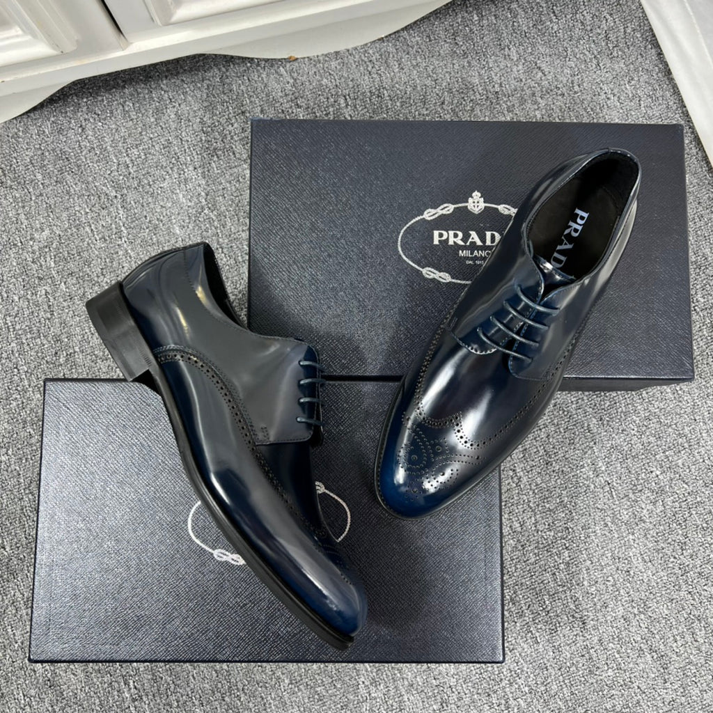 Prada unisex leather lace-up oxford shoes, dark blue, brogue detailing and box set
