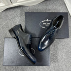 Prada unisex leather lace-up oxford shoes, dark blue, brogue detailing and box set