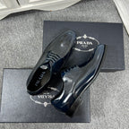 Prada unisex leather lace-up oxford shoes, dark blue, matching pair with branding
