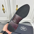 Prada unisex leather oxford shoe outsole, dark sole with Prada logo on heel