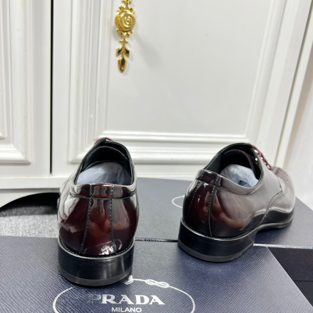 Prada unisex leather lace-up dress shoes, heel view and branding