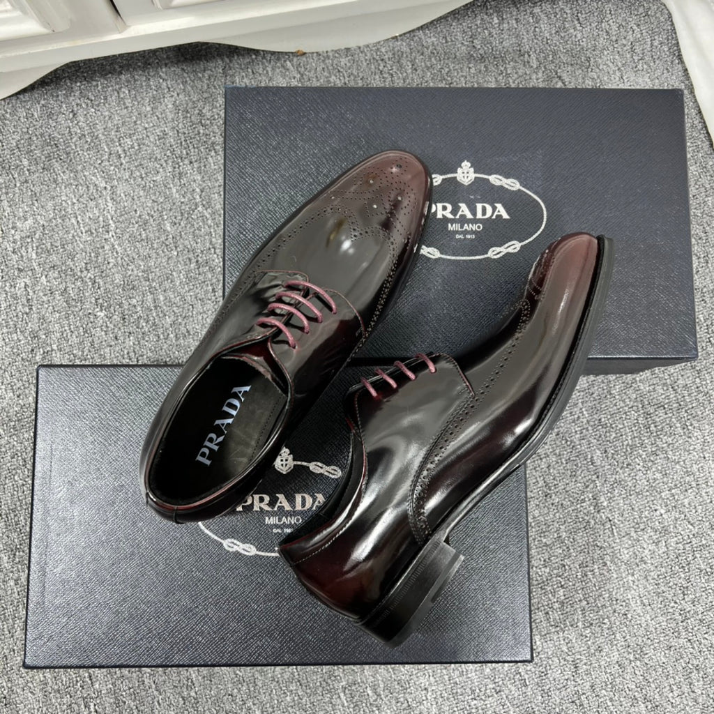 Prada unisex leather lace-up dress shoes, front view with lace detail