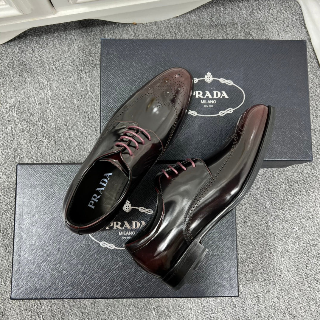 Prada unisex leather lace-up dress shoes, front view with lace detail