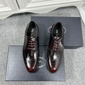 Prada unisex leather lace-up dress shoes, burgundy and black, polished finish