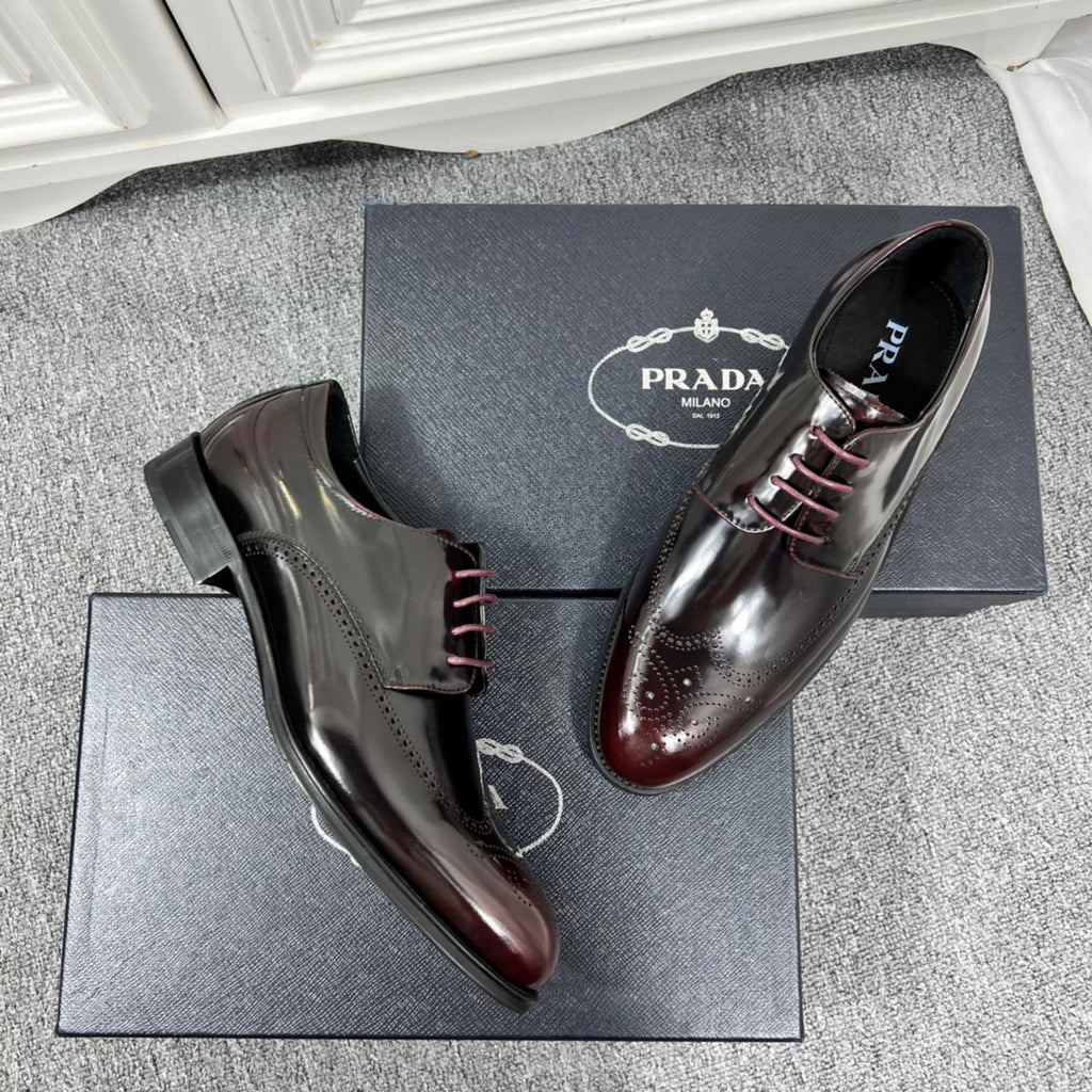 Prada unisex leather lace-up dress shoes, burgundy-toned brogue detailing