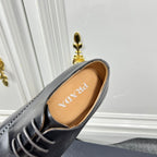 Prada unisex oxford shoe in black leather, close-up of padded interior lining.