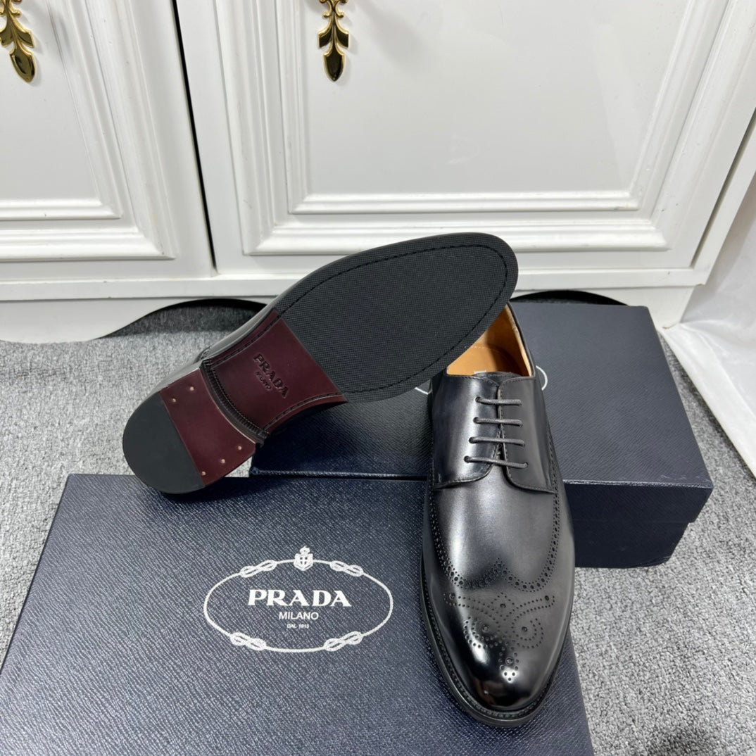 Prada unisex oxford shoes in black leather, sole and side view with lace-up.