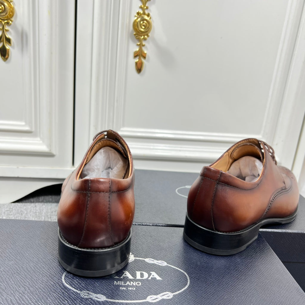Prada unisex lace-up oxford shoes shown from heel, dark brown leather and black soles