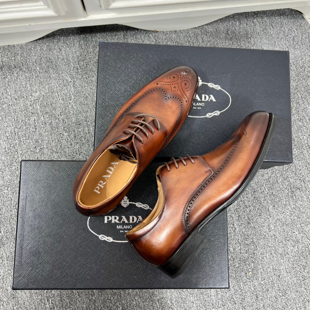 Prada unisex lace-up oxford shoes, dark brown leather; matching box with Prada logo text
