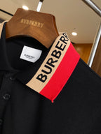 Black Burberry polo collar with red and beige striped trim