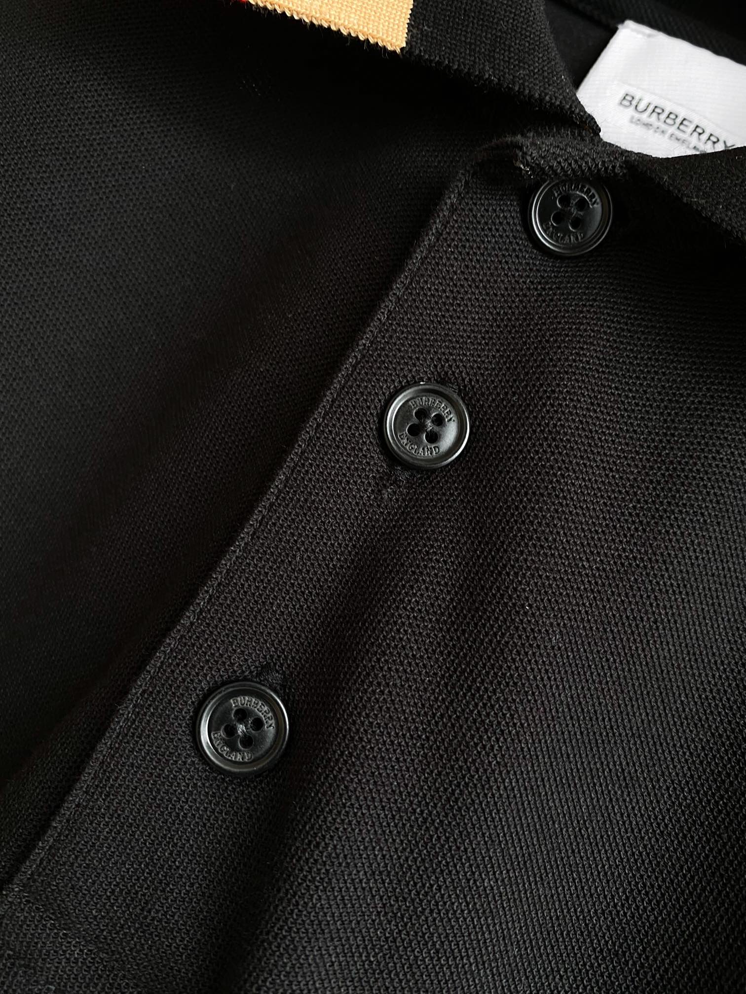 Black Burberry polo shirt with three dark buttons on placket