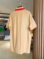 Beige Burberry polo shirt back view with short sleeves and collar stripe