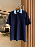Navy Burberry polo shirt with short sleeves and button placket