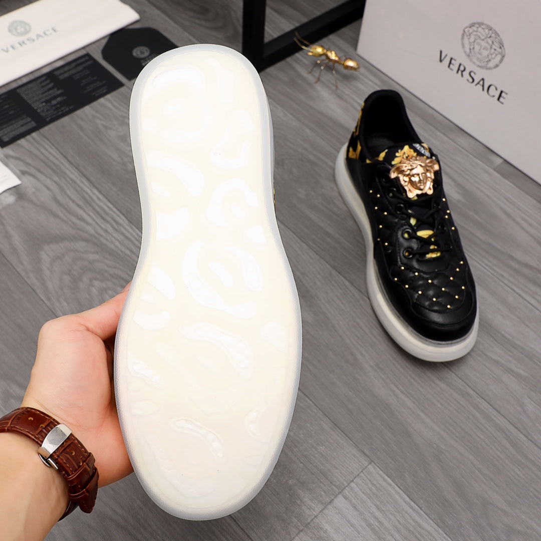 Men's Versace sneakers outsole view: white rubber sole with textured tread.