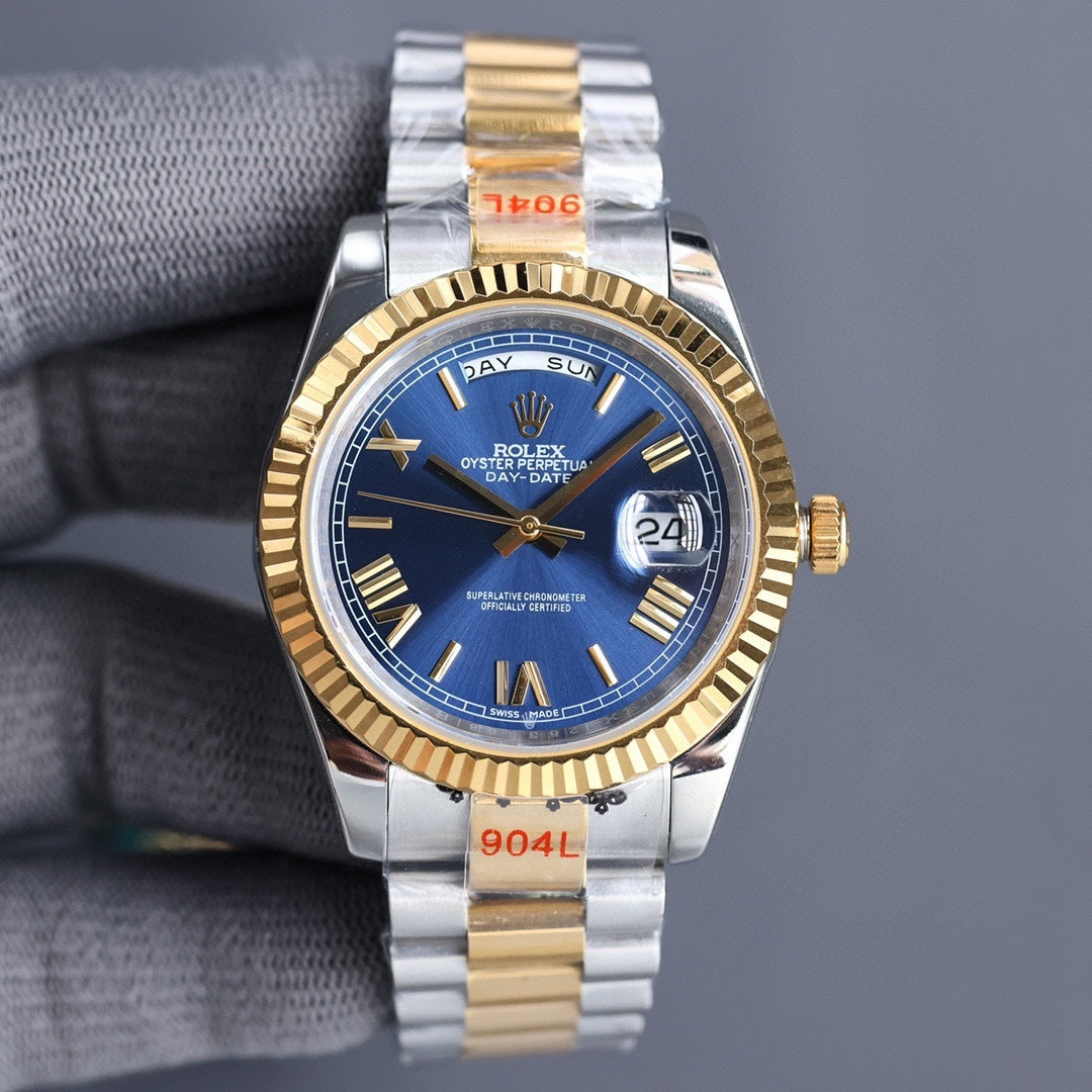Two-tone Rolex watch with blue dial, gold bezel, silver-and-gold bracelet.