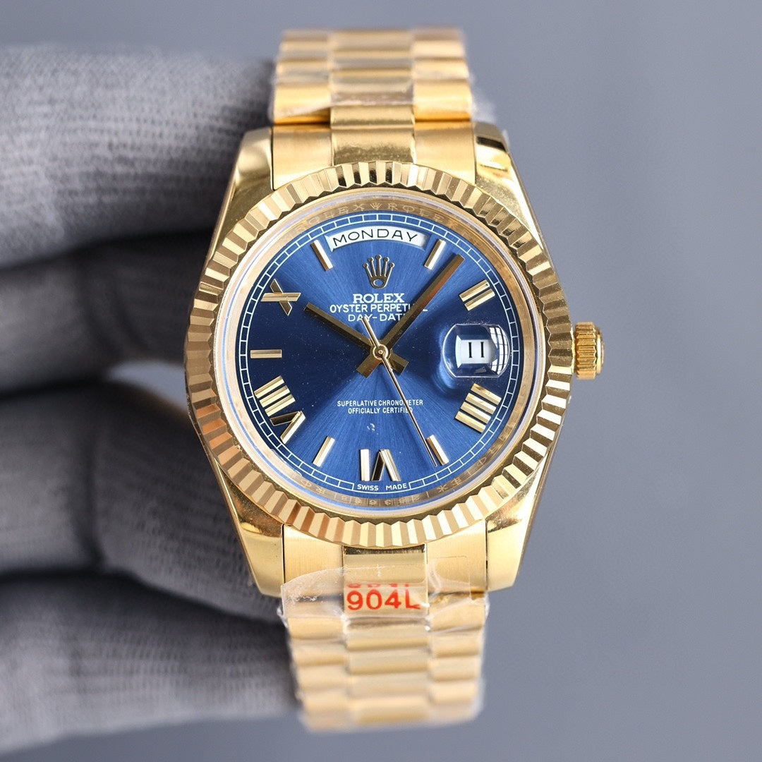 Rolex Day-Date watch with blue dial, gold bezel, and gold-tone bracelet