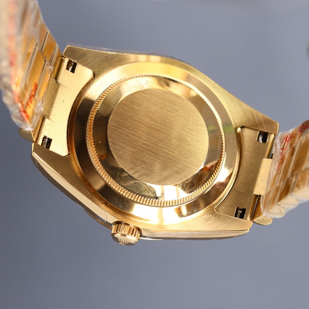 Rolex watch caseback in gold-tone metal, with crown and markings