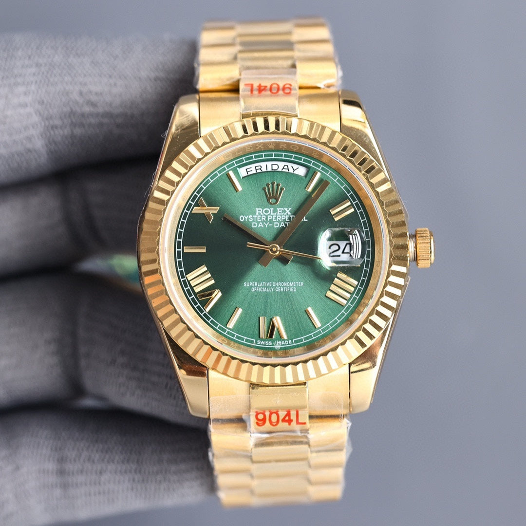 Rolex Day-Date watch with green dial and gold-tone metal bracelet