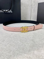 Pale pink leather belt with gold CC buckle, adjustable strap and pin holes.