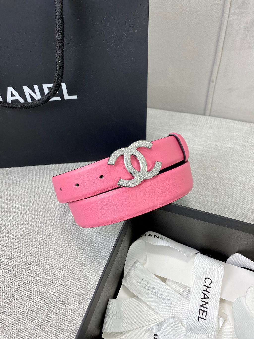 Chanel pink leather belt with silver CC buckle and perforated strap