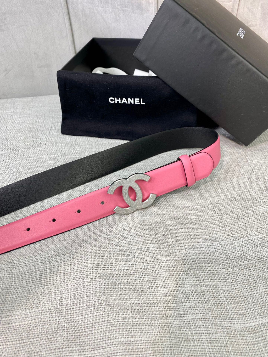 Chanel pink leather belt with silver CC centerpiece and punched holes
