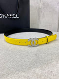 Chanel belt in bright yellow leather with gold CC logo buckle, laid flat