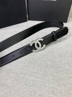 Chanel belt with black leather strap and silver-tone CC buckle, side view