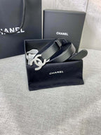 Chanel belt in gift box, black leather strap with silver-tone CC logo buckle