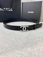 Chanel belt with black leather strap and silver-tone CC logo buckle