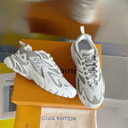 Luxury sneakers by Louis Vuitton in white and gray, lace-up with chunky outsole