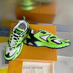 Louis Vuitton sneakers with neon green uppers, white paneling, and chunky black outsole
